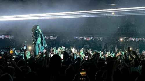 Lorde singing from the middle of the crowd at the Armory. 