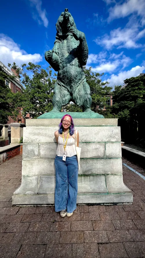 Ramona in front of a statue of Bruno at Brown University. 