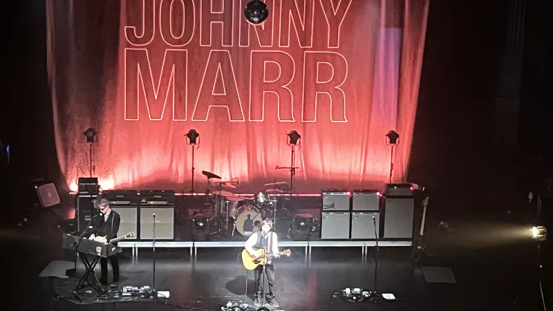 Johnny Marr on stage at Palace Theater  